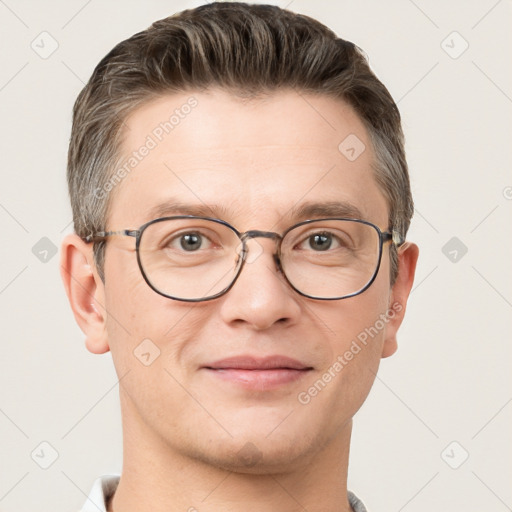 Joyful white adult male with short  brown hair and grey eyes