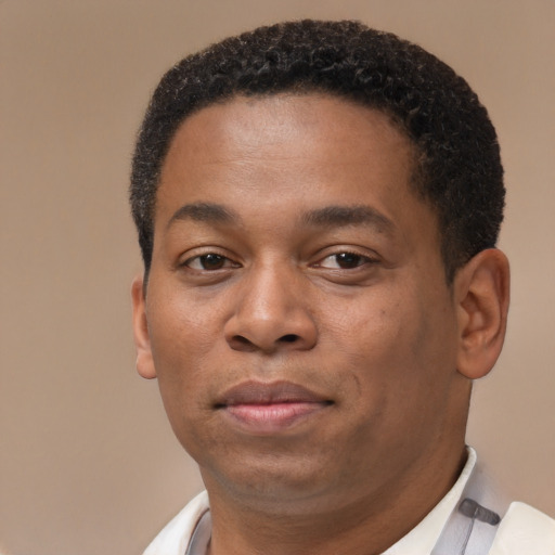 Neutral black young-adult male with short  brown hair and brown eyes