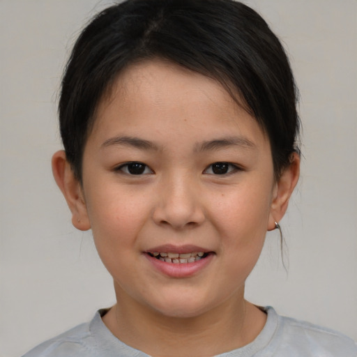 Joyful white child female with medium  brown hair and brown eyes