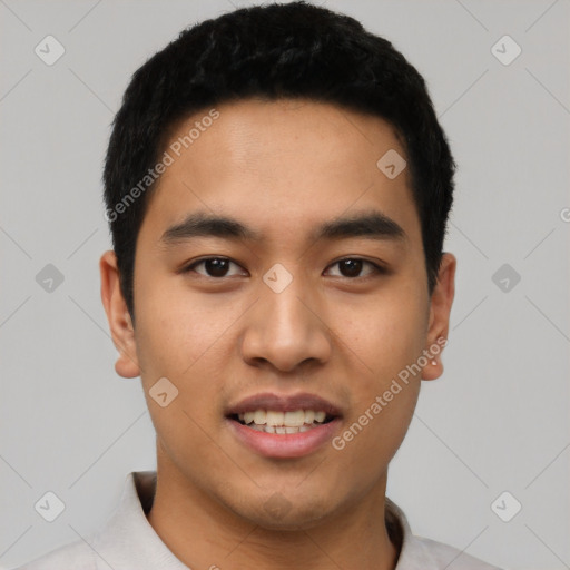 Joyful asian young-adult male with short  black hair and brown eyes