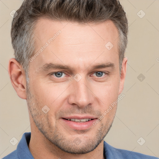 Joyful white adult male with short  brown hair and grey eyes