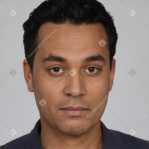 Neutral white young-adult male with short  black hair and brown eyes