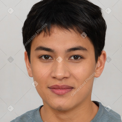 Joyful asian young-adult male with short  brown hair and brown eyes