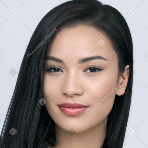 Joyful asian young-adult female with long  black hair and brown eyes