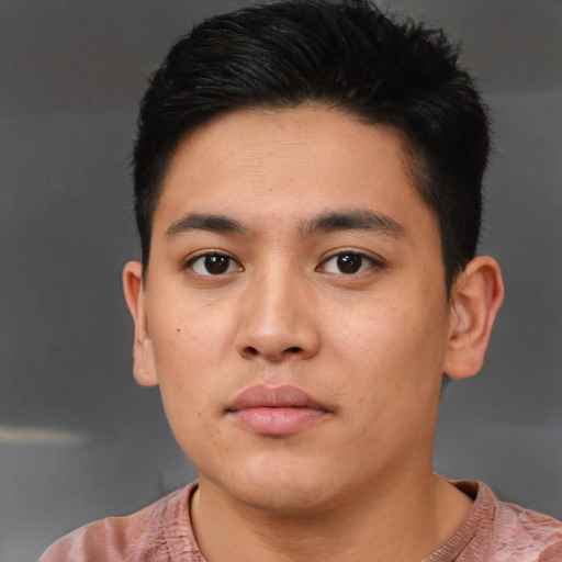 Neutral latino young-adult male with short  brown hair and brown eyes