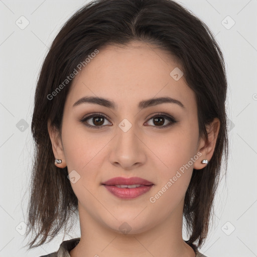 Joyful white young-adult female with medium  brown hair and brown eyes