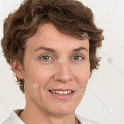 Joyful white adult female with short  brown hair and grey eyes