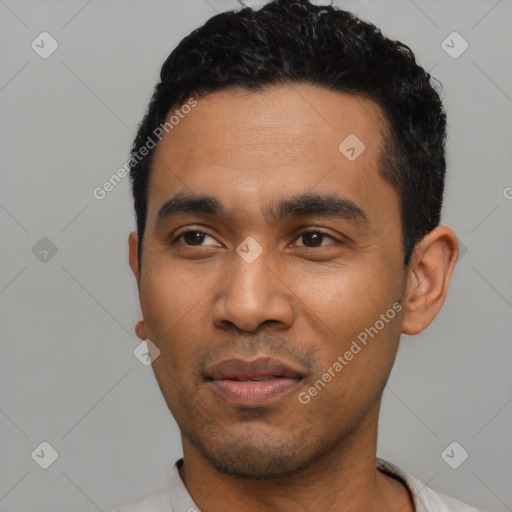 Neutral latino young-adult male with short  black hair and brown eyes