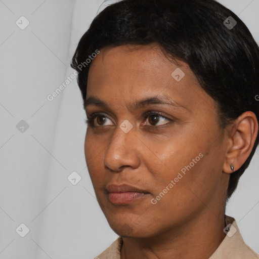 Neutral black young-adult female with short  black hair and brown eyes