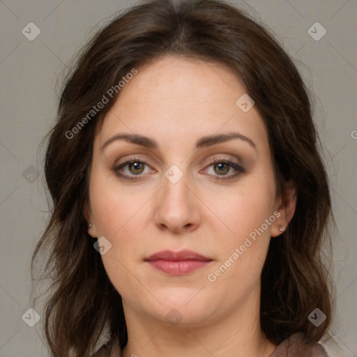 Joyful white young-adult female with long  brown hair and green eyes