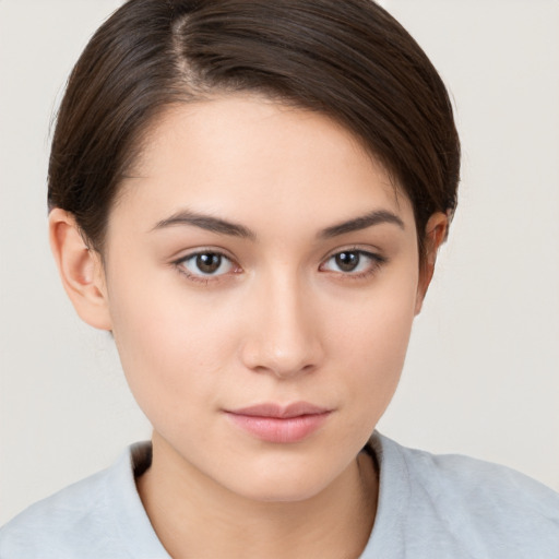 Neutral white young-adult female with medium  brown hair and brown eyes