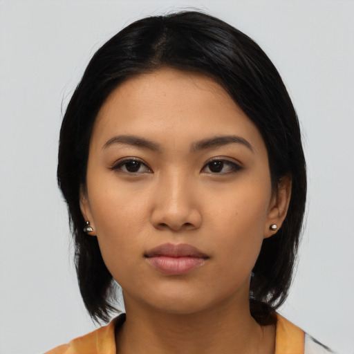 Neutral asian young-adult female with medium  black hair and brown eyes