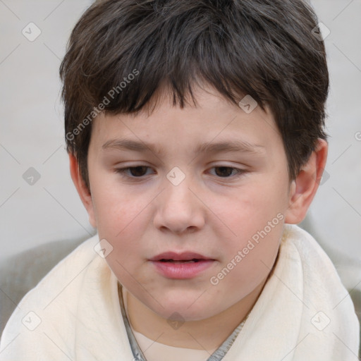 Joyful white child male with short  brown hair and brown eyes