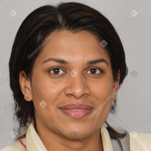 Joyful latino adult female with medium  brown hair and brown eyes