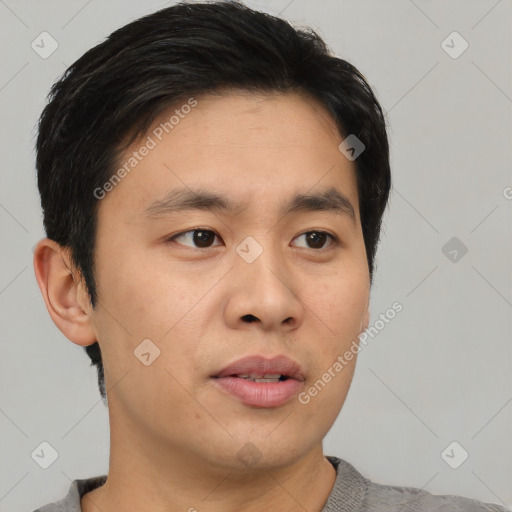 Neutral asian young-adult male with short  black hair and brown eyes