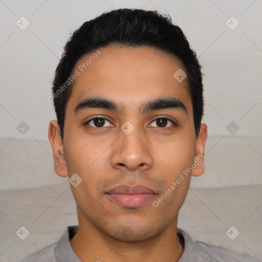 Neutral latino young-adult male with short  black hair and brown eyes