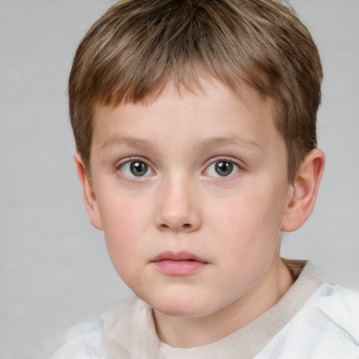 Neutral white child male with short  brown hair and grey eyes