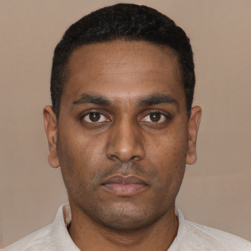Neutral black young-adult male with short  black hair and brown eyes