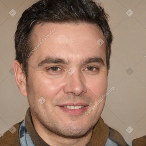 Joyful white adult male with short  brown hair and brown eyes