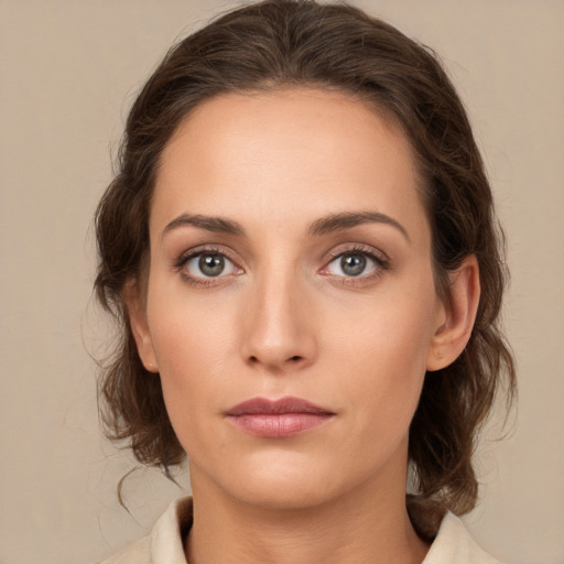 Neutral white young-adult female with medium  brown hair and brown eyes