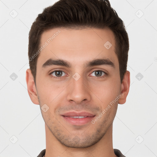 Joyful white young-adult male with short  brown hair and brown eyes