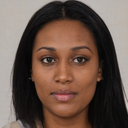 Joyful asian young-adult female with long  brown hair and brown eyes