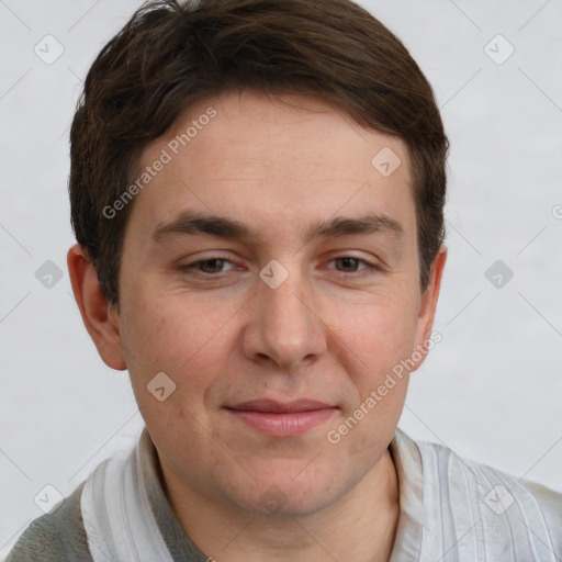 Joyful white adult male with short  brown hair and grey eyes