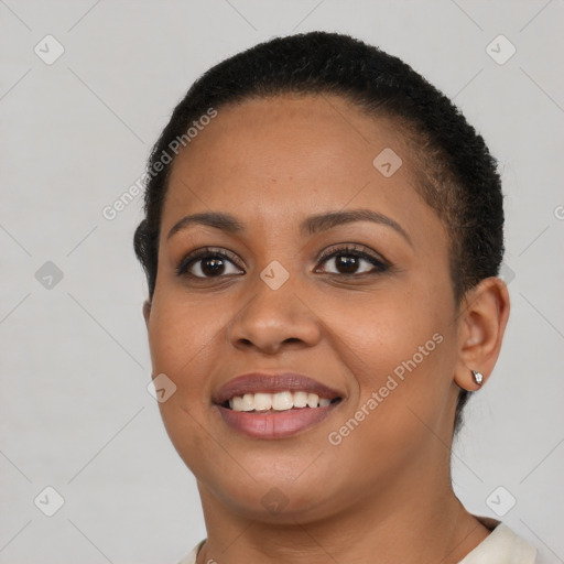 Joyful latino young-adult female with short  brown hair and brown eyes