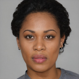 Neutral black young-adult female with short  black hair and brown eyes