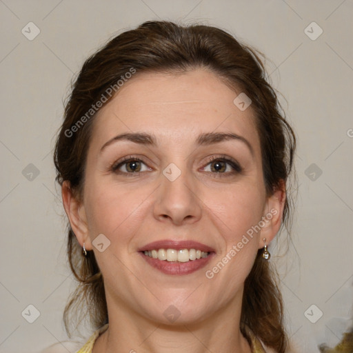 Joyful white adult female with medium  brown hair and grey eyes