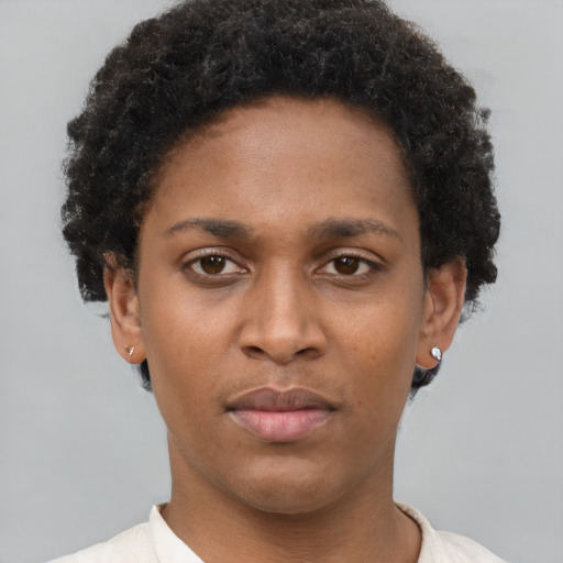 Neutral latino young-adult female with short  brown hair and brown eyes