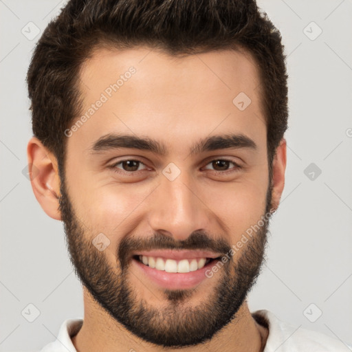 Joyful white young-adult male with short  brown hair and brown eyes