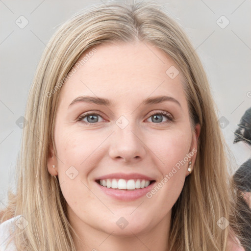 Joyful white young-adult female with long  brown hair and grey eyes