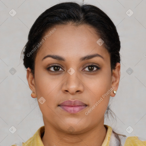 Joyful latino young-adult female with short  brown hair and brown eyes