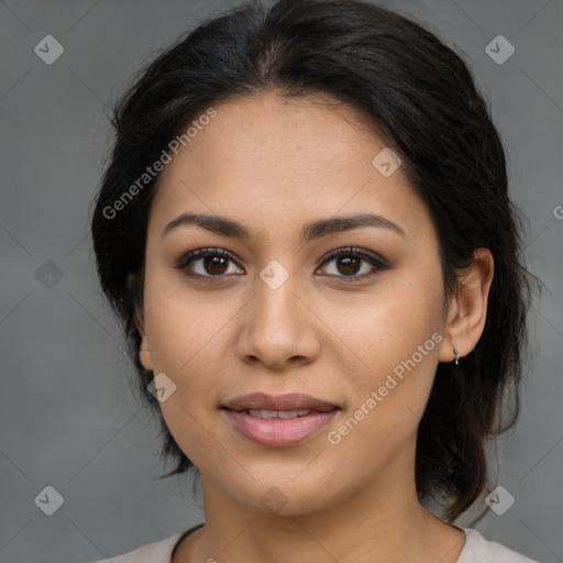 Joyful latino young-adult female with medium  brown hair and brown eyes