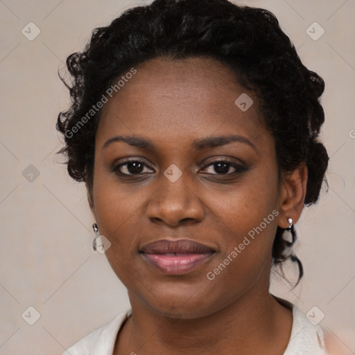 Joyful black young-adult female with medium  black hair and brown eyes