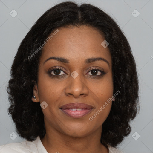 Joyful black young-adult female with medium  brown hair and brown eyes