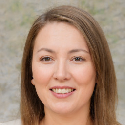 Joyful white young-adult female with medium  brown hair and brown eyes