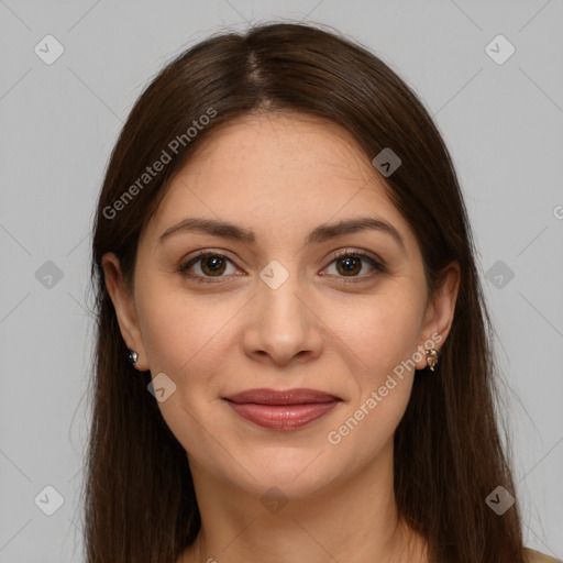 Joyful white young-adult female with long  brown hair and brown eyes