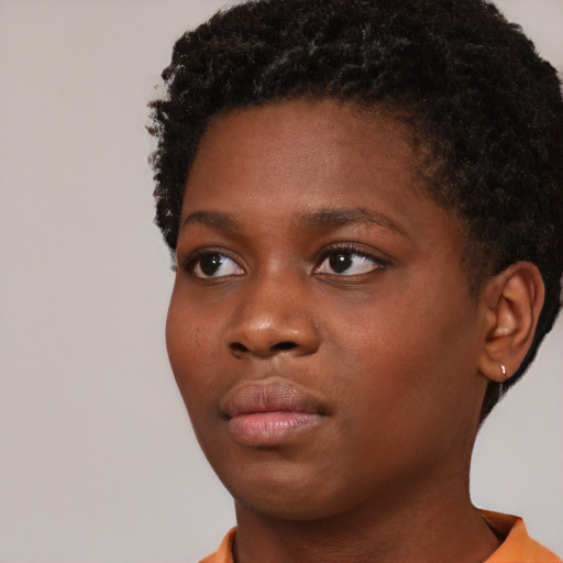 Neutral black young-adult female with short  brown hair and brown eyes