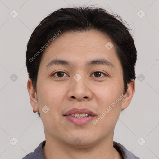 Joyful asian young-adult male with short  brown hair and brown eyes