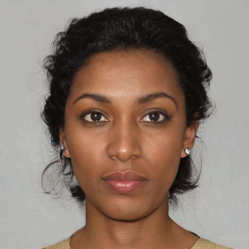 Neutral black young-adult female with medium  black hair and brown eyes