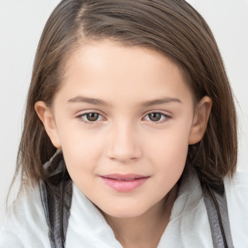 Joyful white child female with long  brown hair and brown eyes