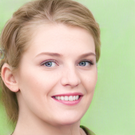 Joyful white young-adult female with short  brown hair and green eyes