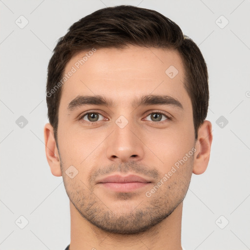 Neutral white young-adult male with short  brown hair and brown eyes