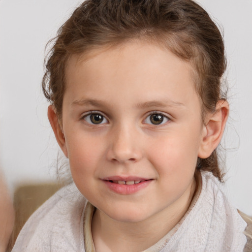 Joyful white child female with medium  brown hair and brown eyes