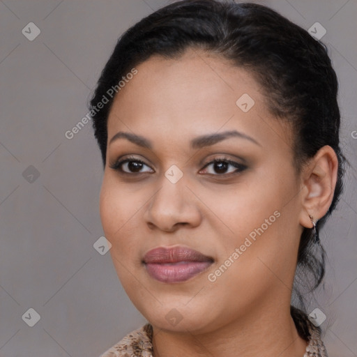 Joyful black young-adult female with medium  brown hair and brown eyes