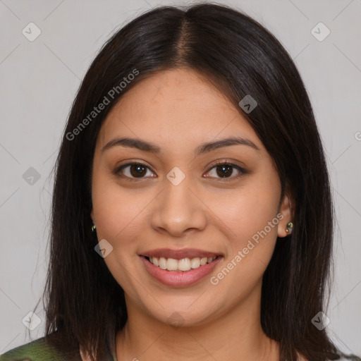 Joyful latino young-adult female with medium  brown hair and brown eyes