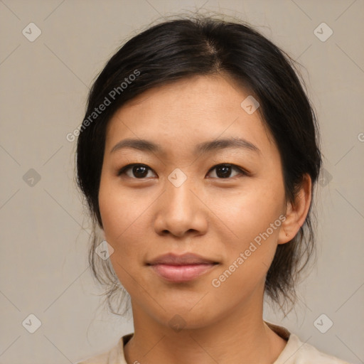 Joyful asian young-adult female with medium  brown hair and brown eyes