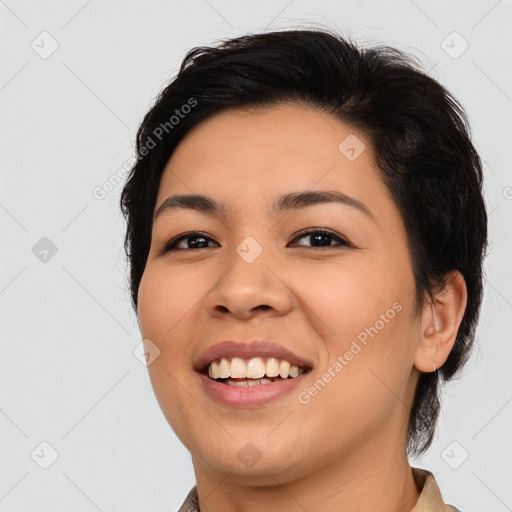 Joyful asian young-adult female with medium  brown hair and brown eyes